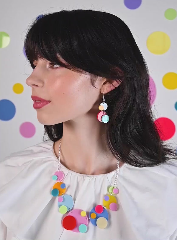 Colourful statement necklace and earrings made from multi colour acrylic circle polka dots