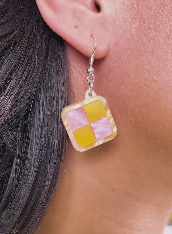 Video of Battenberg Cake Earrings handmade from pearlescent pink and yellow acrylic