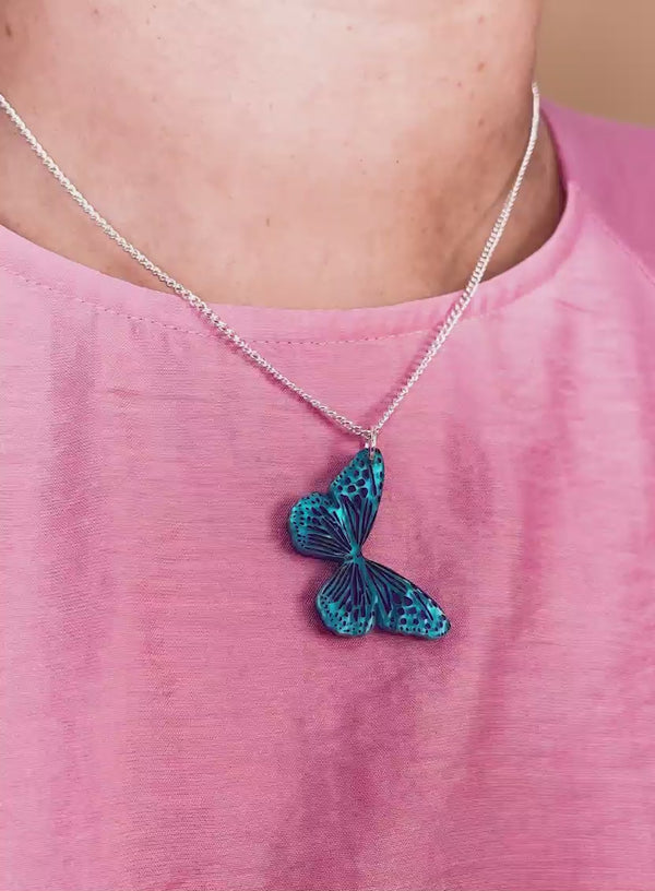 Blue butterfly pendant necklace