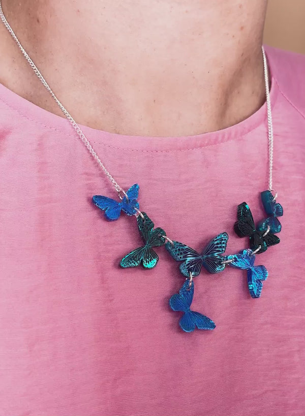 Blue butterfly graduating necklace