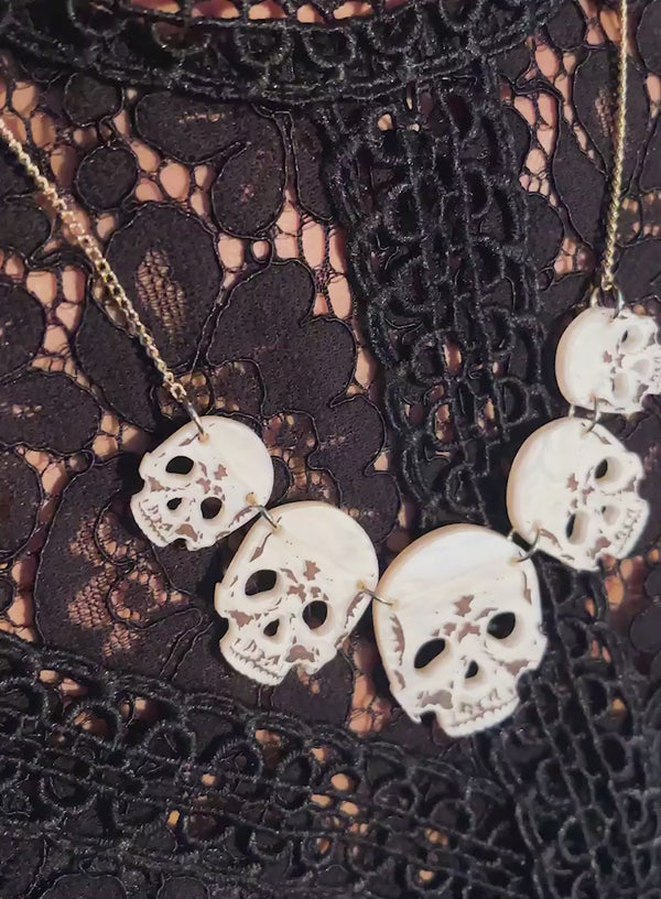 Video of the Ancient Skulls Link Necklace handmade from Ivory Pearl Acrylic